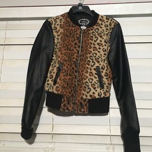 A cheetah print sweater with no hood